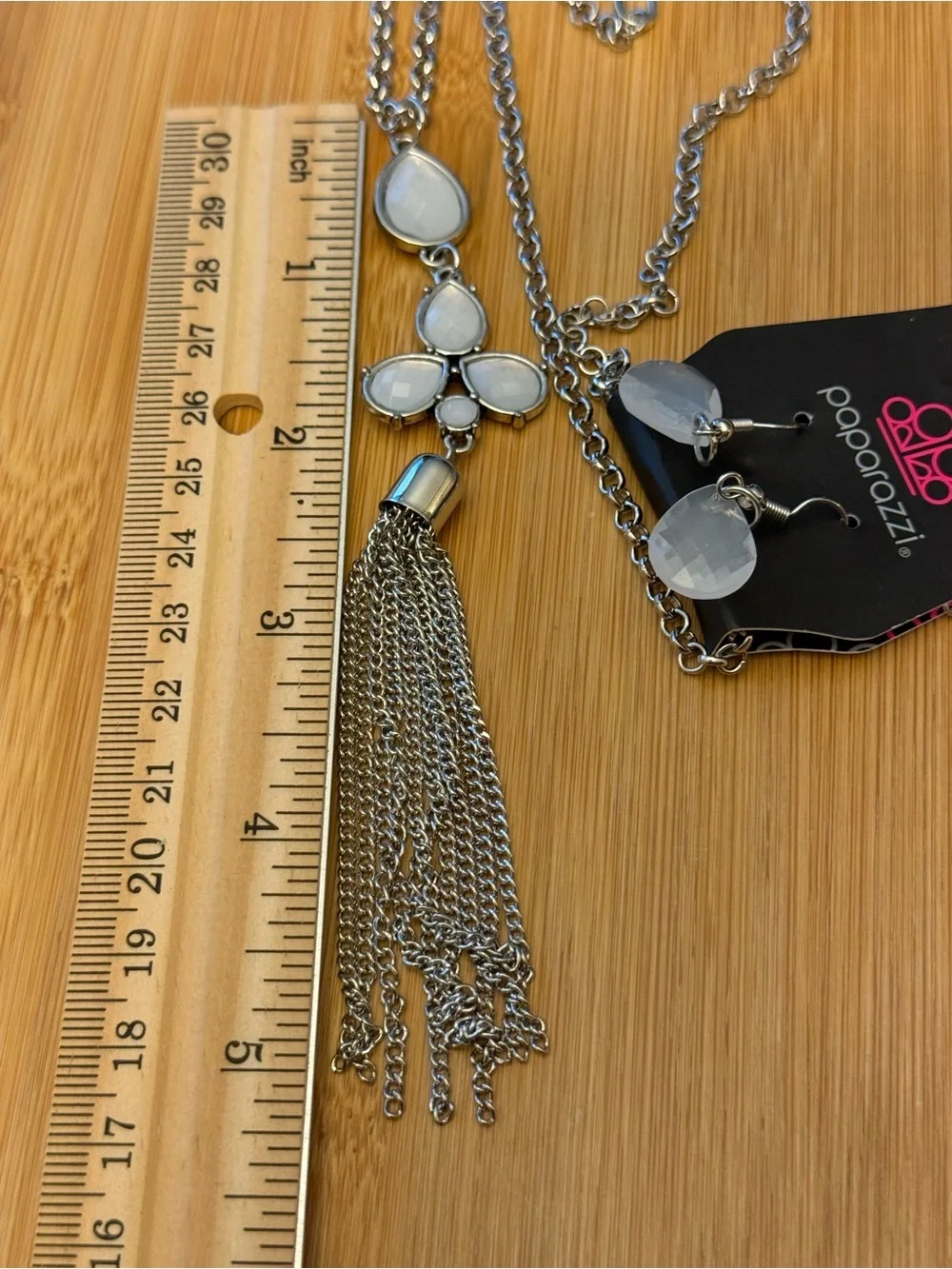Silver Tone Tassel Pendant Necklace with White Teardrop Accents